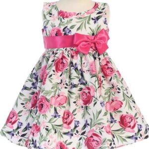 A pink and white floral dress with a bow.