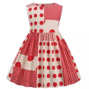 A red and white polka dot dress with a heart on it.