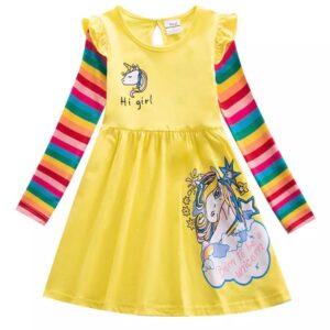 A yellow dress with rainbow sleeves and unicorn on it.
