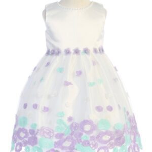 A white dress with purple and blue flowers on it.