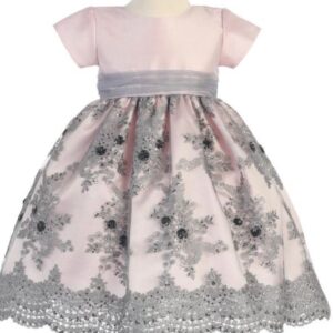 A pink and gray dress with silver lace