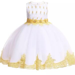 A white and yellow dress with gold trim