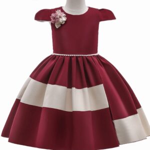 A red and white dress with flowers on it