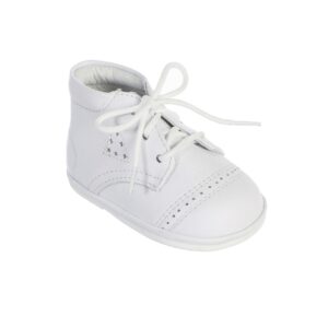 A white shoe is shown with laces.